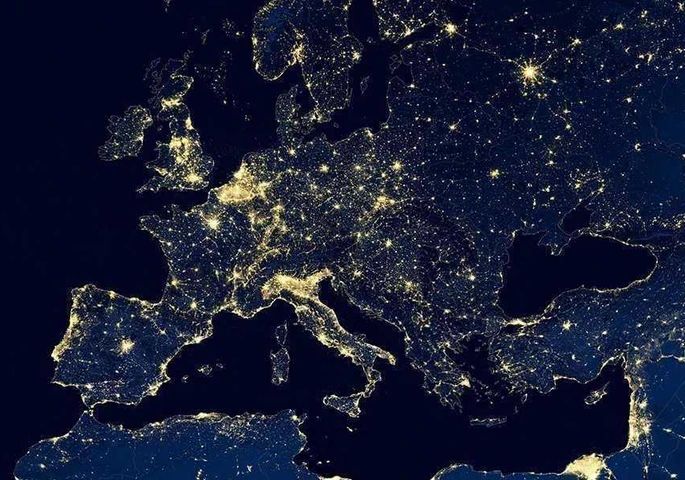 Satellite view of city lights across European continent.