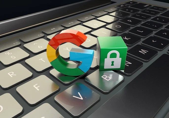 Google logo on a keyboard with a lock block next to it