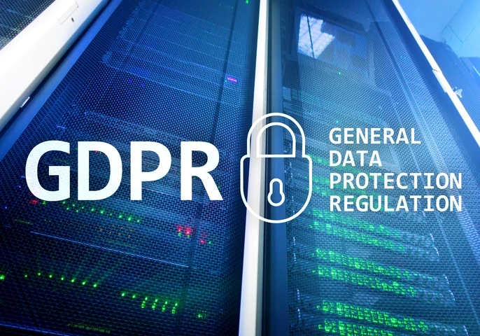 Text "GDPR" and "General Data Protection Regulation" on the backdrop of blue servers.