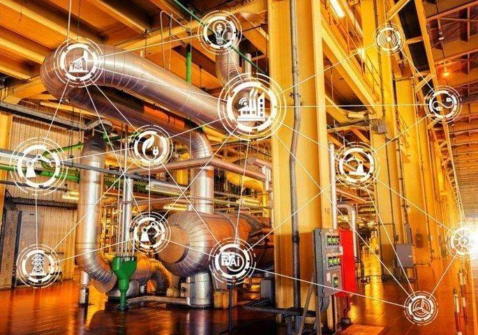 Industrial programmable logic controllers connected within an IIoT environment.