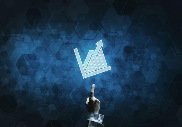 Hand holding up an animated graph against a honeycomb background.