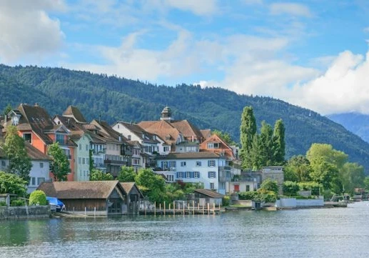 Lake Zug in Switzerland with the lakeside town and hills in the background