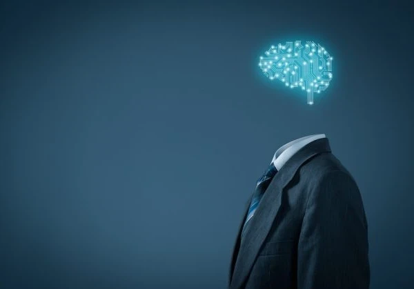 A body with a suit on and an animated brain floating above it.