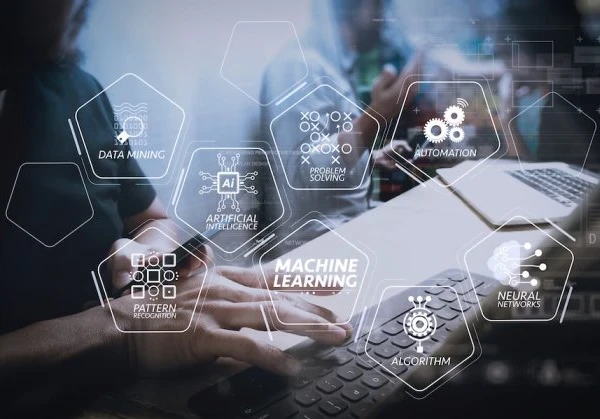 a person working on a laptop with 'machine learning' and 'algorithm' overlaid