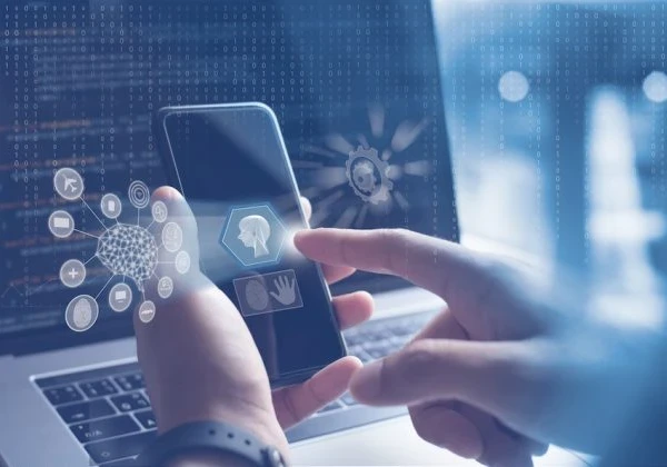Person using a smartphone with various AI symbols