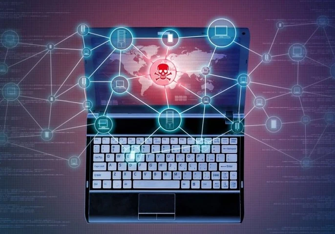 A red skull and cross bones on a laptop screen.