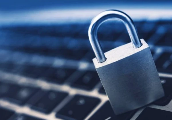 image showing a padlock in front of a keyboard