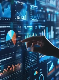 A hand pointing at a transparent screen displaying graphs.