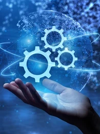Hand holding up an animated logo of gears.