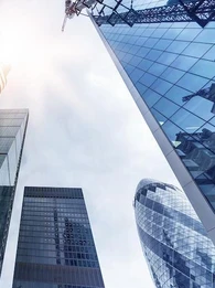 Photo taken from City of London showing various London skyscrapers including the Gherkin