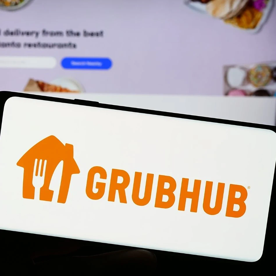 The GrubHub orange logo on a smartphone screen.
