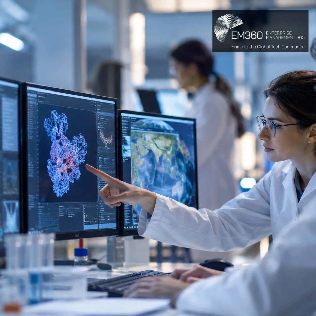 EM360Tech header graphic featuring two scientists in white lab coats studying molecular structures and Earth observation data on computer monitors in a blue-lit laboratory. A dark translucent overlay displays the white EM360TECH logo and headline, “Google Opens Frontier AI Models to 200 European Scientists.”