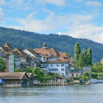 Lake Zug in Switzerland with the lakeside town and hills in the background