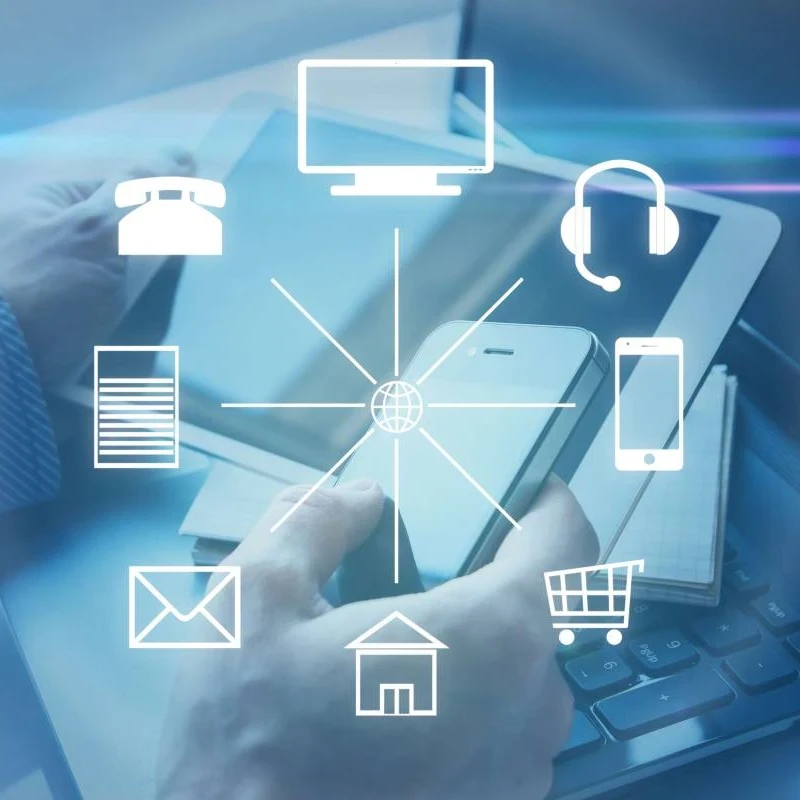 Communication icons overlaid on top of a person using a smartphone, tablet and laptop.