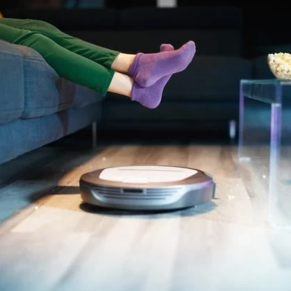 roomba cleaning the floor of a home